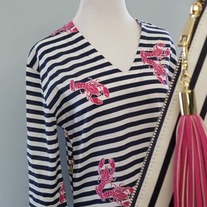 Tunic and clutch by Tracy Negoshian